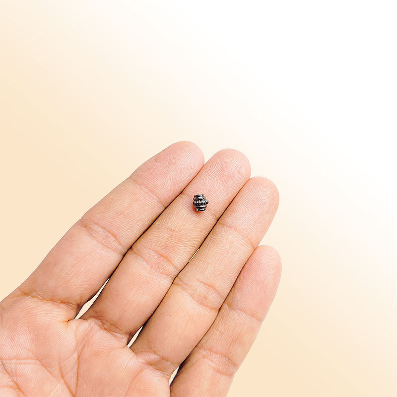 Handcrafted black rhodium overlay ribbed floral copper spacer bead from India for modern jewelry designs
