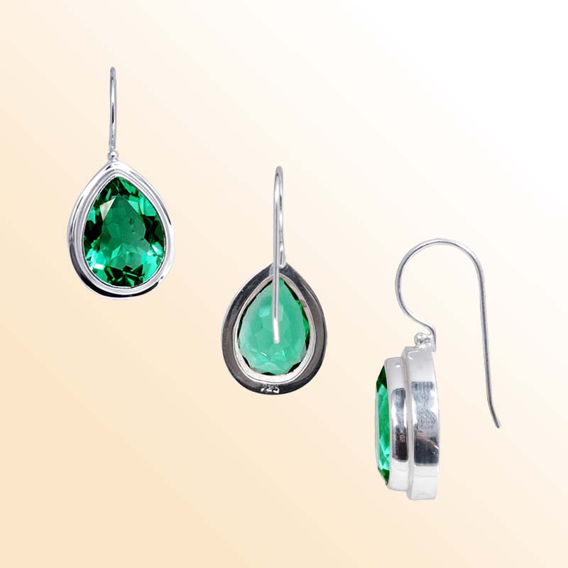 Handcrafted Sterling Silver earrings with pear-cut Green Quartz featuring a polished bezel frame and graceful hook design.