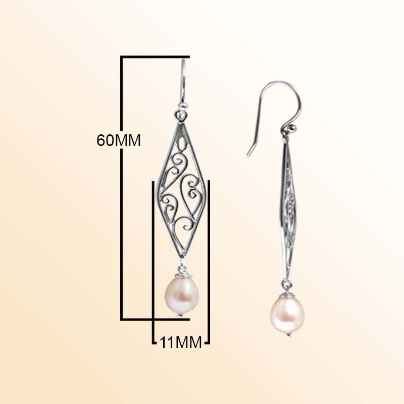 Handcrafted sterling silver filigree earrings adorned with lustrous teardrop freshwater pearls