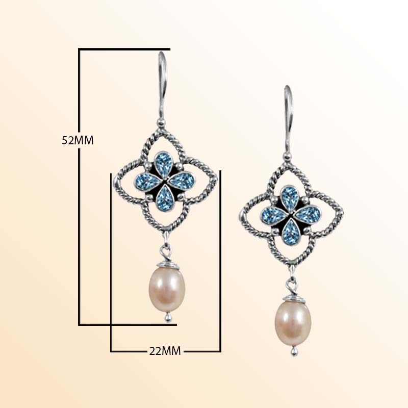 Handcrafted Sterling Silver earrings with Fresh Water Pearl and Blue Topaz Quartz featuring floral rope frame design and polished finish.