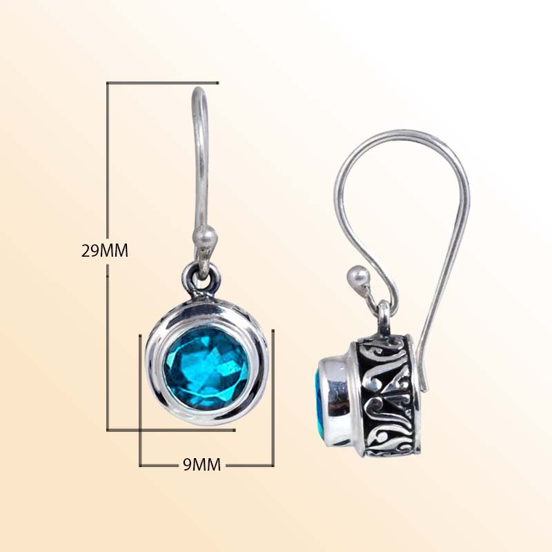 Handcrafted Sterling Silver Blue Topaz Quartz round earrings with Balinese carvings and polished finish.