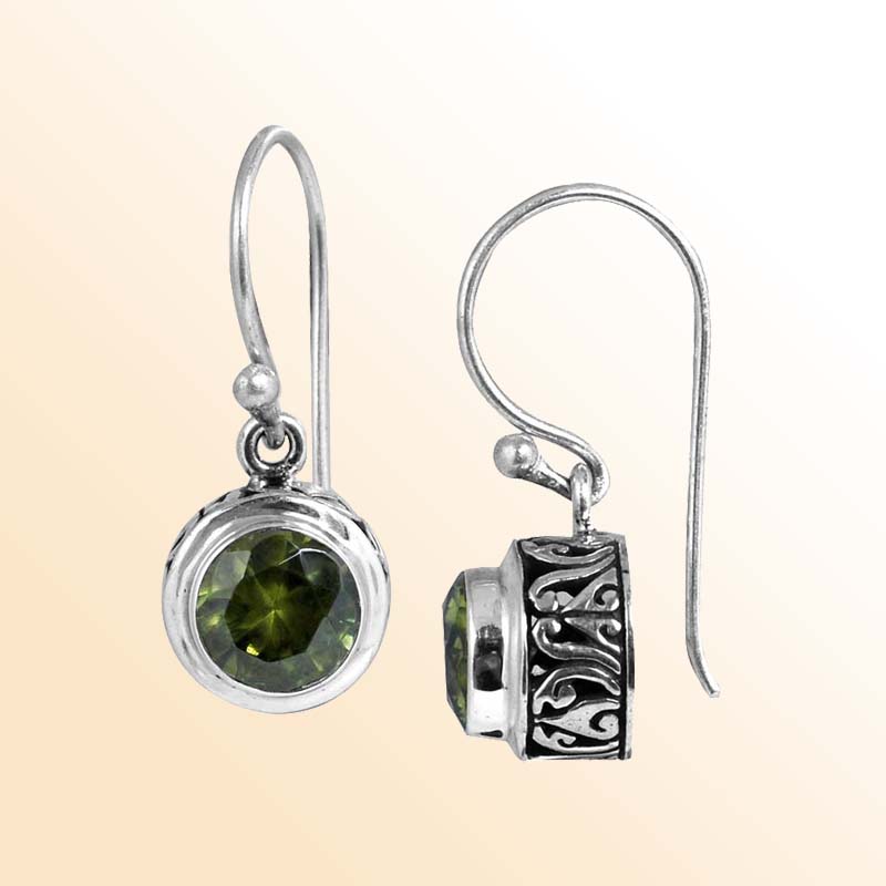 Handcrafted Sterling Silver Peridot round earrings with Balinese carvings and polished silver finish.