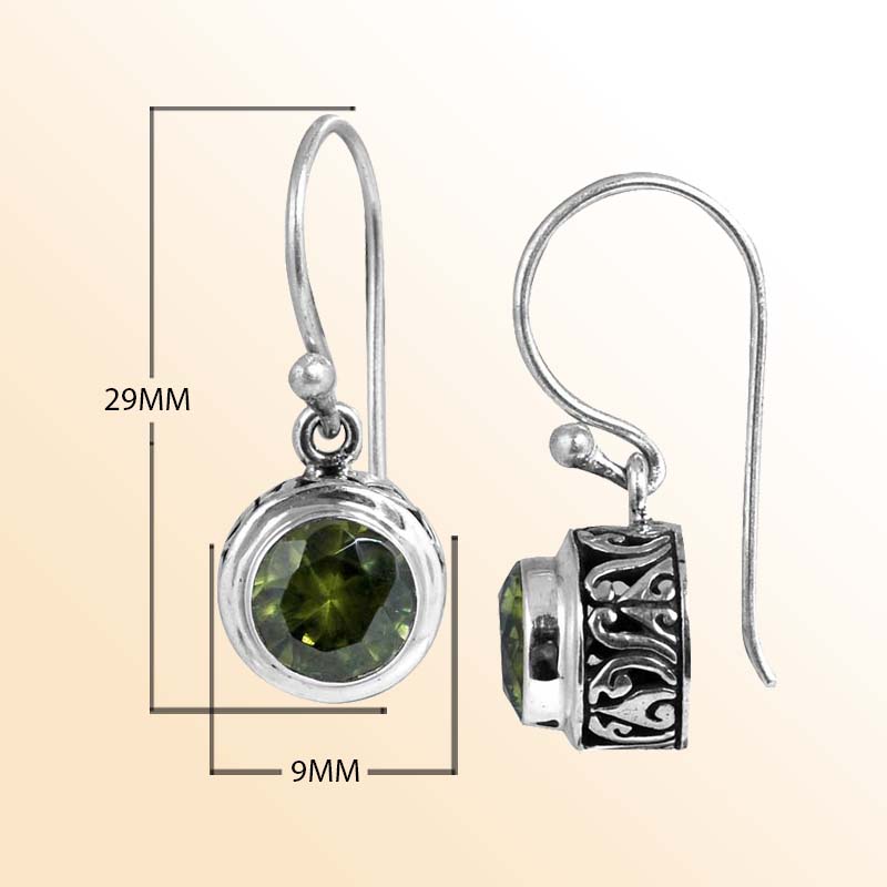 Handcrafted Sterling Silver Peridot round earrings with Balinese carvings and polished silver finish.