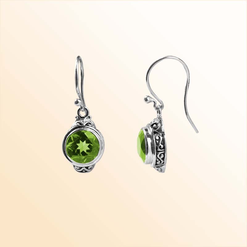 Elegant sterling silver round-shaped Peridot Quartz earrings with artistic side detailing and earwire lock, polished for modern elegance and timeless jewelry charm.
