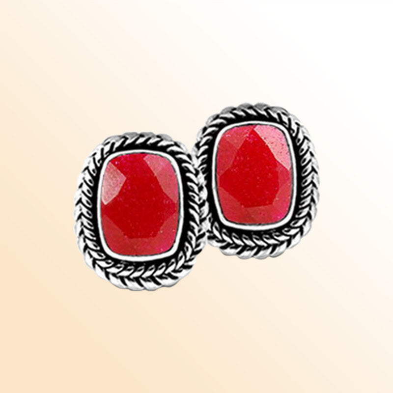 Artisan Sterling Silver Earrings With Radiant Ruby In Braided Cushion Design.