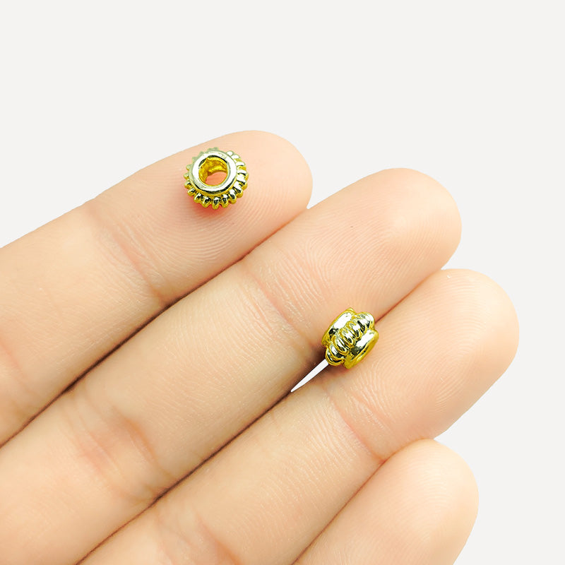 Decorative Bali donut spacer bead with 18K gold overlay, handcrafted in India
