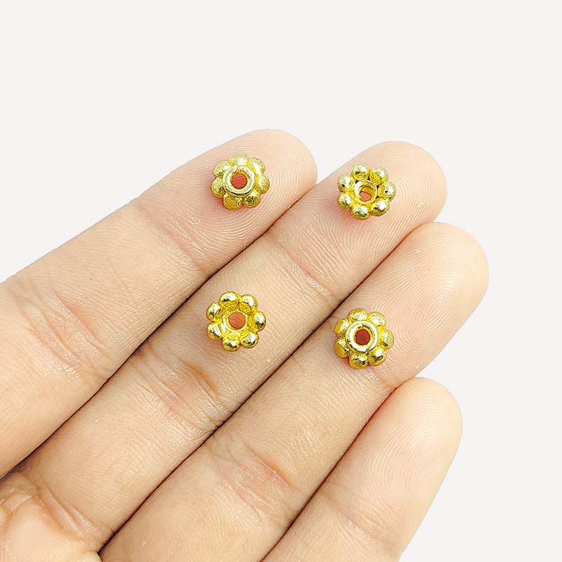 18K gold overlay over copper daisy spacer beads handcrafted in India with elegant polished finish and floral design.