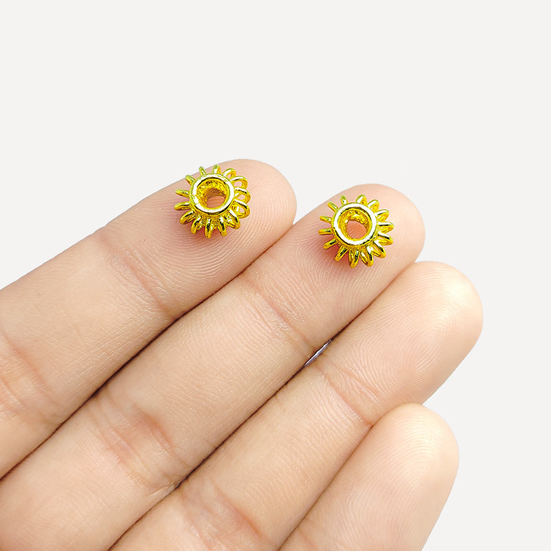 18K gold overlay over copper radiant spacer beads handcrafted in India with sunburst design and polished finish.
