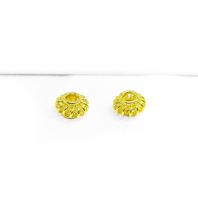 18K gold overlay over copper radiant spacer beads handcrafted in India with sunburst design and polished finish.