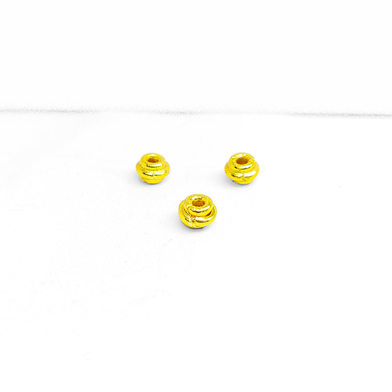 18K gold overlay over copper ribbed spacer beads handcrafted in India with grooved design and polished finish.
