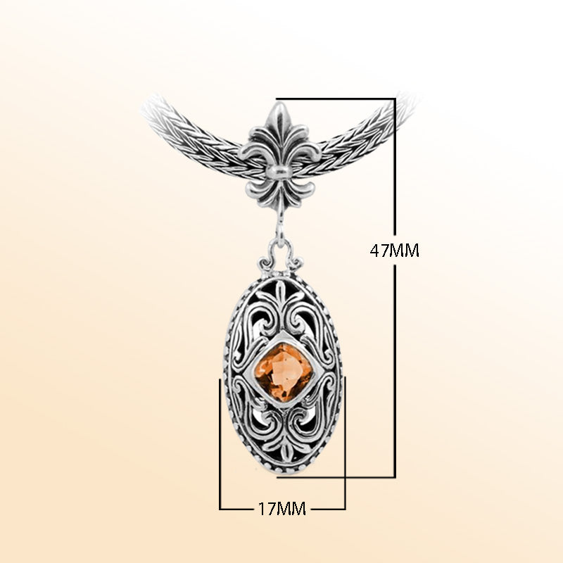Handcrafted Sterling Silver Oval Pendant With Citrine Quartz And Fleur-De-Lis Bail Detailing.