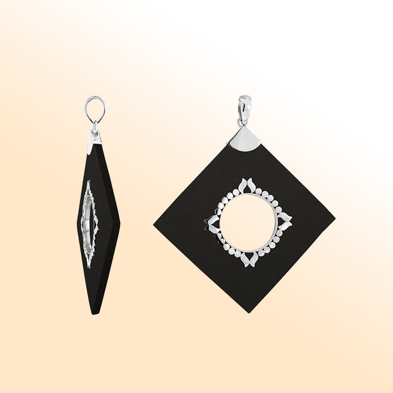Handcrafted Sterling Silver Square Pendant With Black Shell And Central Silver Medallion.