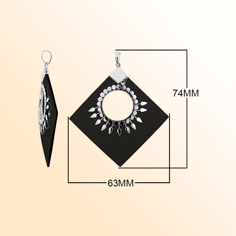 Handcrafted Sterling Silver Diamond Pendant With Black Shell And Sunburst Medallion.
