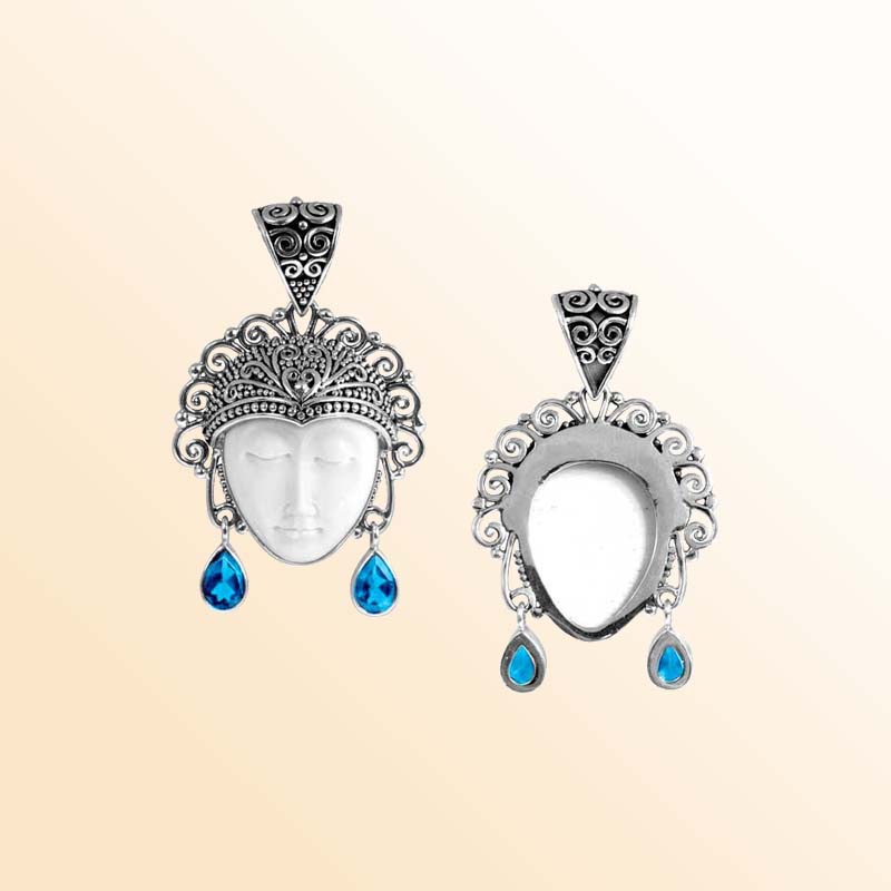 Balinese Sterling Silver Blue Topaz Quartz Bone Face Pendant With Artistic Filigree Design.