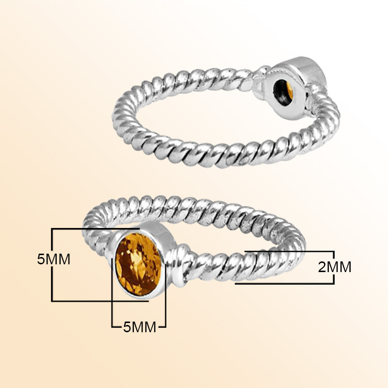 Sterling silver sunshine rope ring with bezel-set Citrine Quartz, handcrafted in Bali.