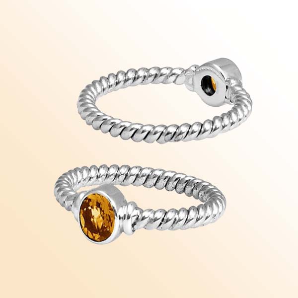 Sterling silver sunshine rope ring with bezel-set Citrine Quartz, handcrafted in Bali.