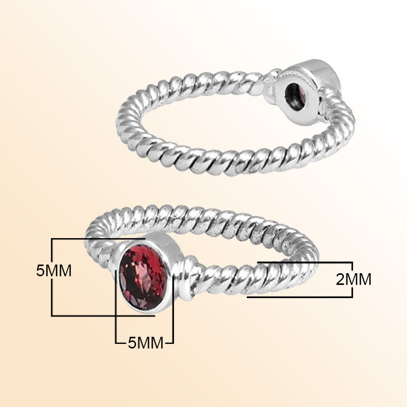 Sterling silver passion rope ring with bezel-set Garnet Quartz, handcrafted in Bali.