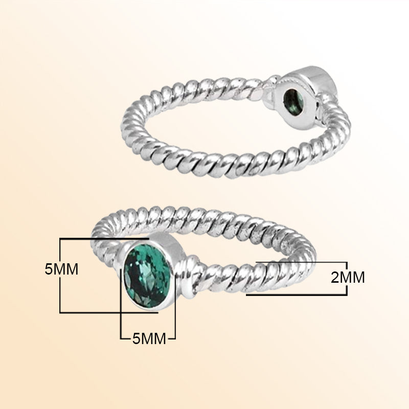 Sterling silver serenity rope ring with bezel-set Green Quartz, handcrafted in Bali.