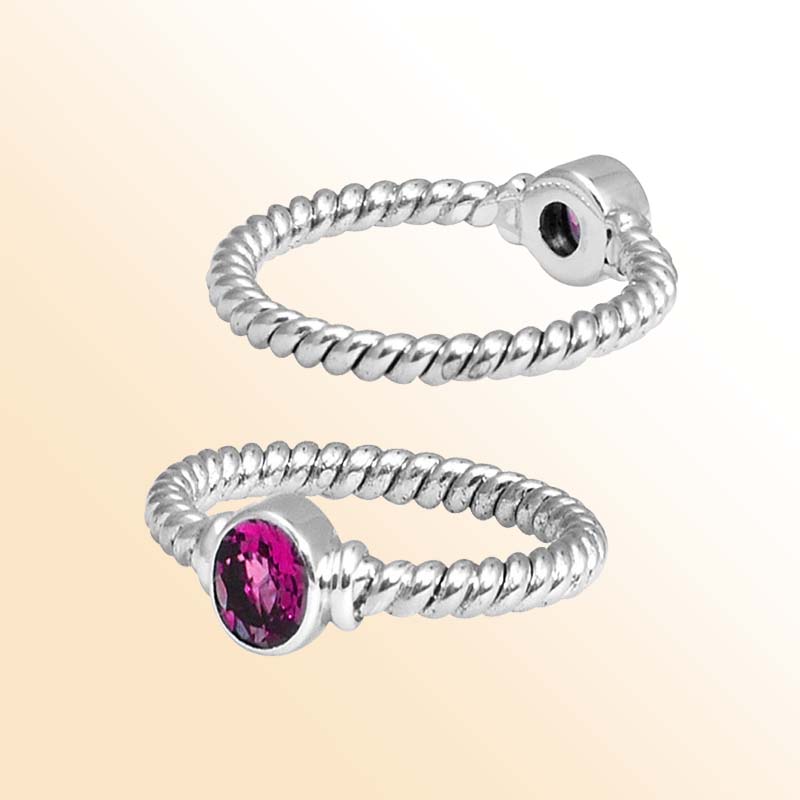 Sterling silver blossom rope ring with bezel-set Pink Quartz, handcrafted in Bali.