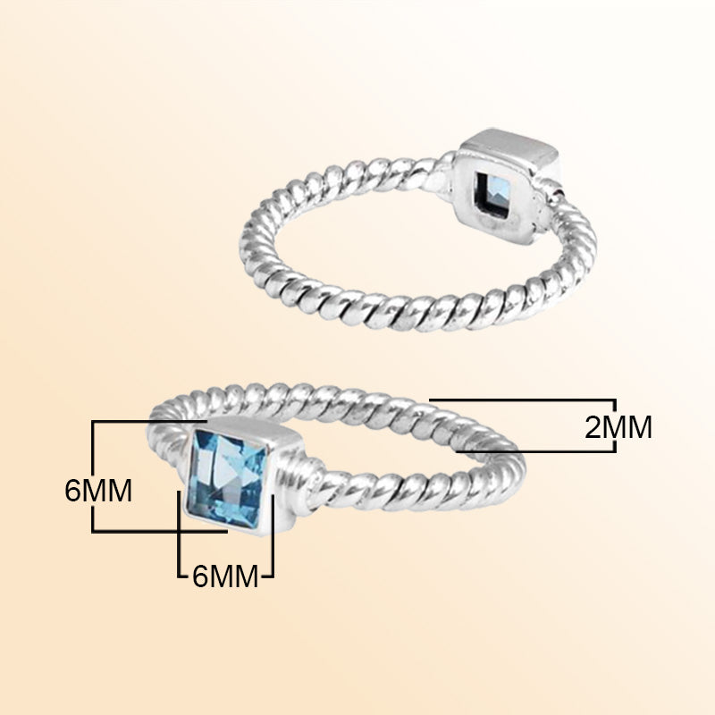 Sterling silver tranquil rope ring with square Blue Topaz Quartz, handcrafted in Bali.