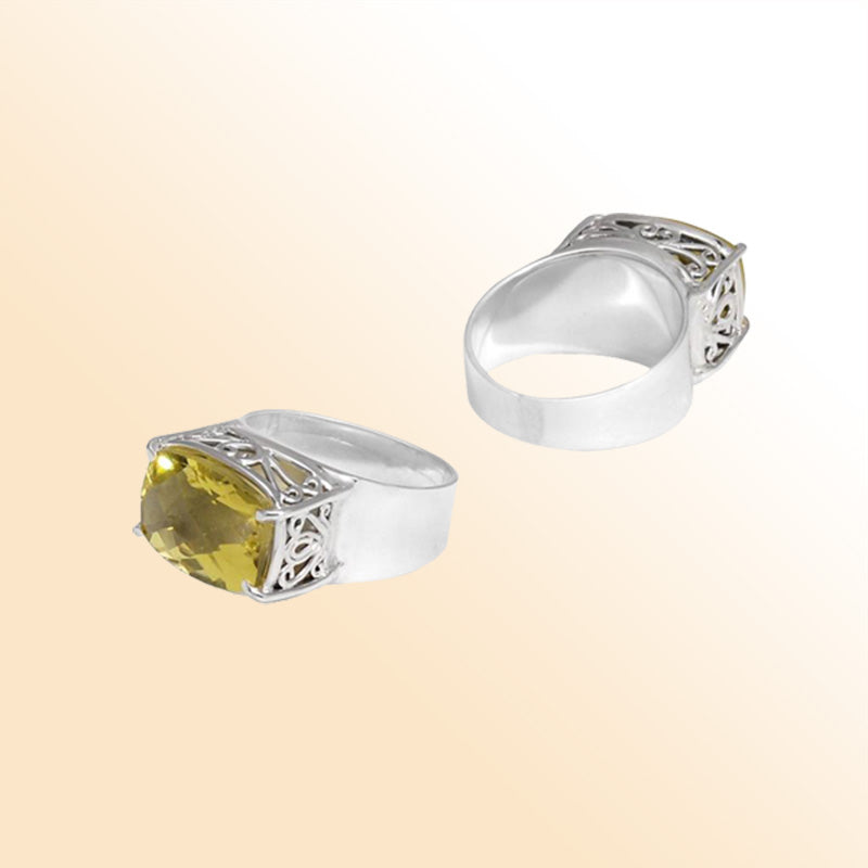 Sterling silver sunshine filigree ring with oval Lemon Quartz, handcrafted in Bali.