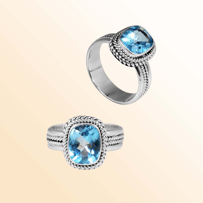 Handcrafted sterling silver Blue Topaz Quartz cushion ring with Bali rope border design