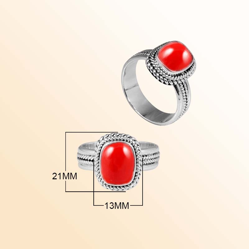 Handcrafted sterling silver Red Coral cushion ring with braided Bali rope frame