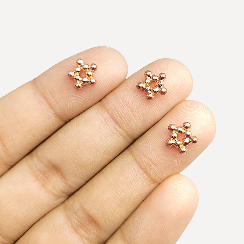 Decorative cluster spacer bead in rose gold overlay over copper handcrafted in India for retail jewelry designs