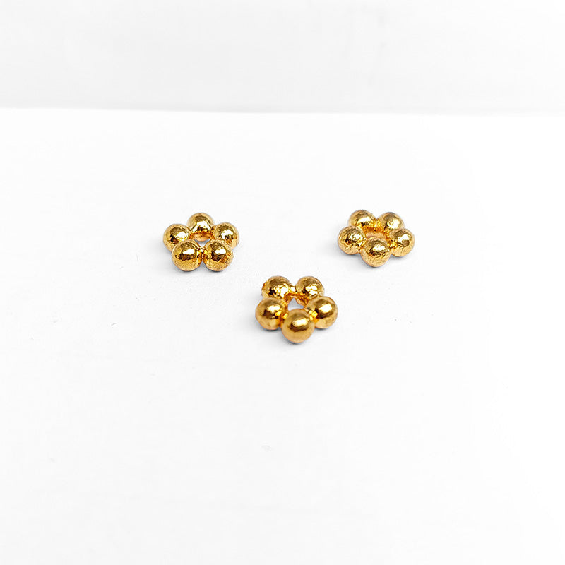 Handcrafted rose gold flower spacer beads made of copper with polished finish from India