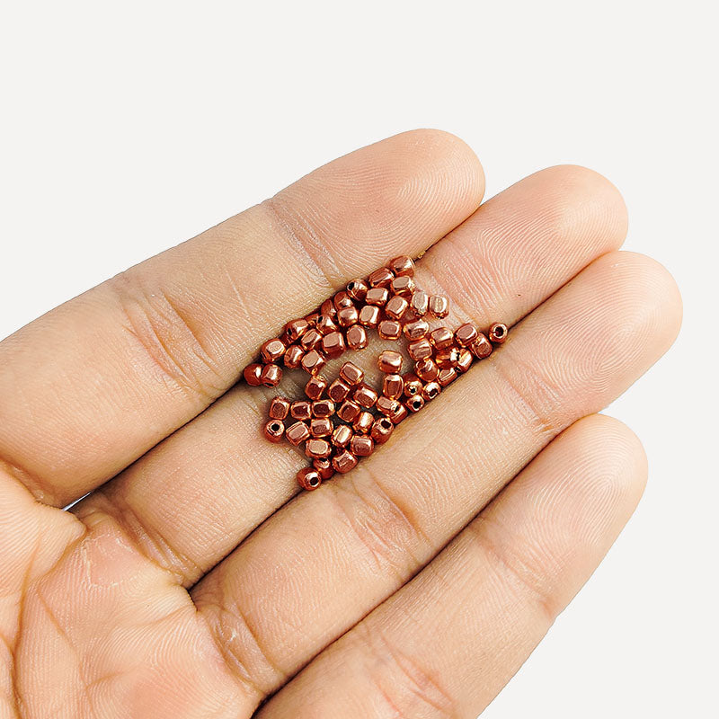 Handcrafted rose gold overlay copper washer bead from India with polished finish