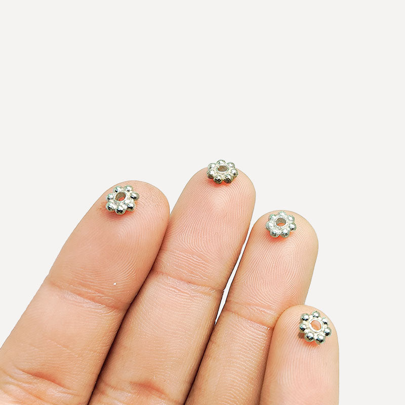 Floral spacer bead with center hole, Silver Overlay Over Copper, handcrafted in India for elegant jewelry designs.