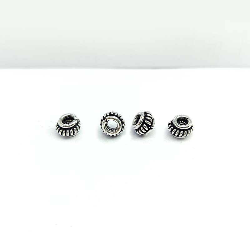 Silver Overlay Over Copper textured beaded spacer charm, handcrafted in India for handmade jewelry designs.