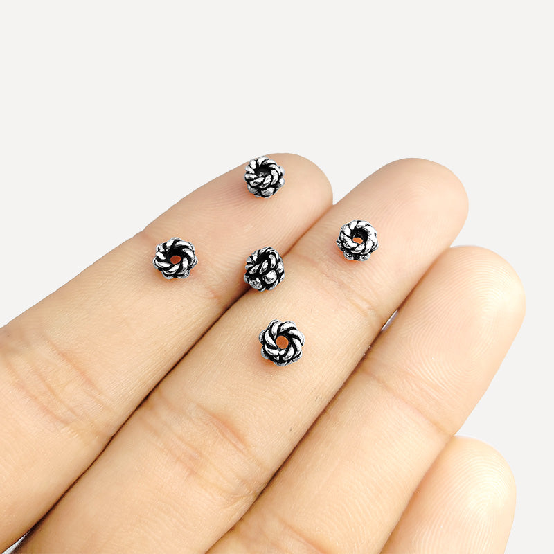 Silver Overlay Over Copper rope texture spacer charm, handcrafted in India for handmade jewelry designs.