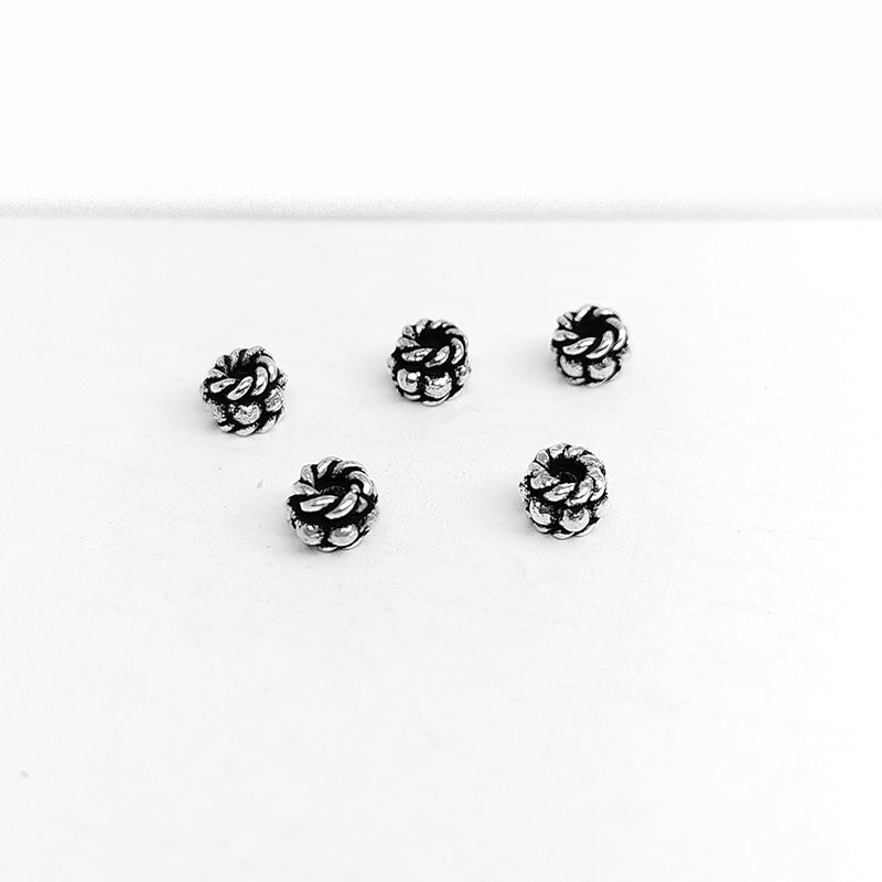 Silver Overlay Over Copper rope texture spacer charm, handcrafted in India for handmade jewelry designs.