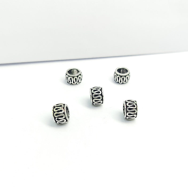 Silver Overlay Over Copper abstract wave spacer charm, handcrafted in India for handmade jewelry designs.