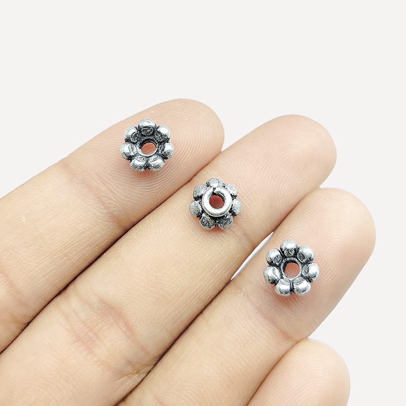Silver Overlay Over Copper delicate floral spacer charm, handcrafted in India for handmade jewelry designs.