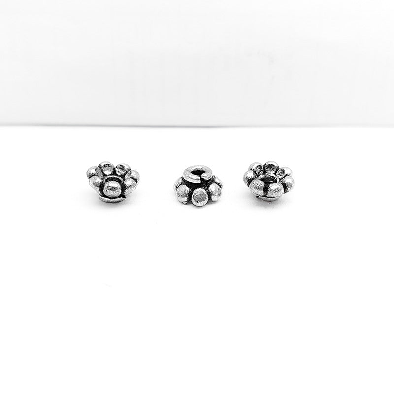 Silver Overlay Over Copper delicate floral spacer charm, handcrafted in India for handmade jewelry designs.