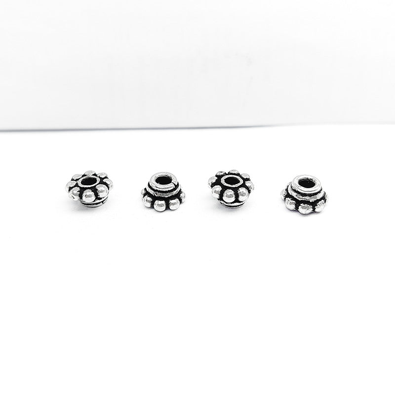 Silver Overlay Over Copper decorative layered floral spacer charm, handcrafted in India for handmade jewelry designs.