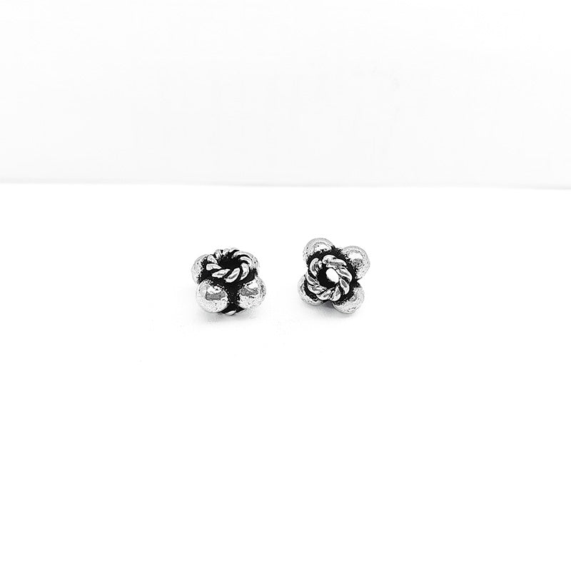 Silver Overlay Over Copper rope knot floral spacer charm, handcrafted in India for handmade jewelry designs.