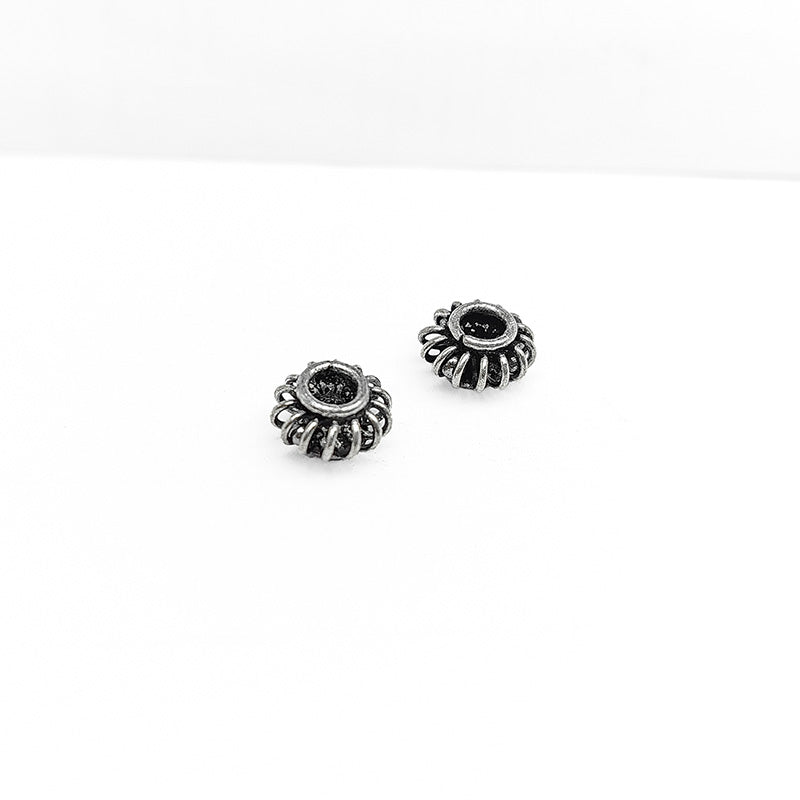 Silver Overlay Over Copper sculptural circular jewelry accent with oxidized surface handcrafted in India