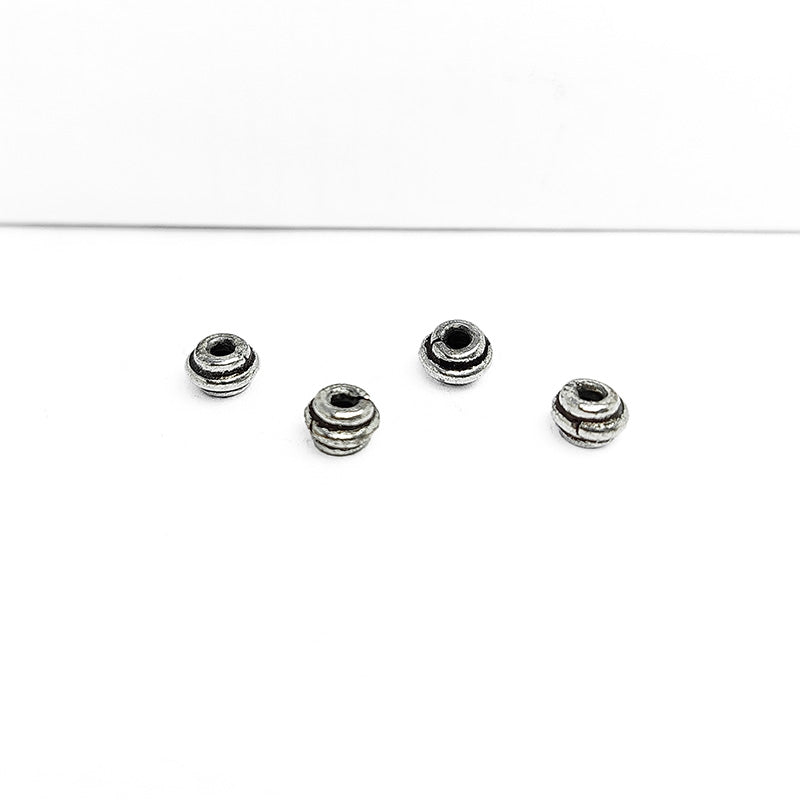 Silver Overlay Over Copper decorative spacer with layered circular design and oxidized surface handcrafted in India