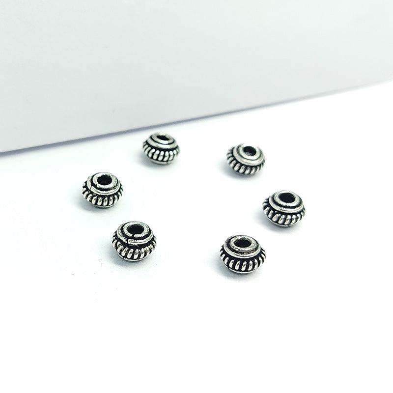 Silver Overlay Over Copper decorative spacer with ridged circular design and oxidized surface handcrafted in India