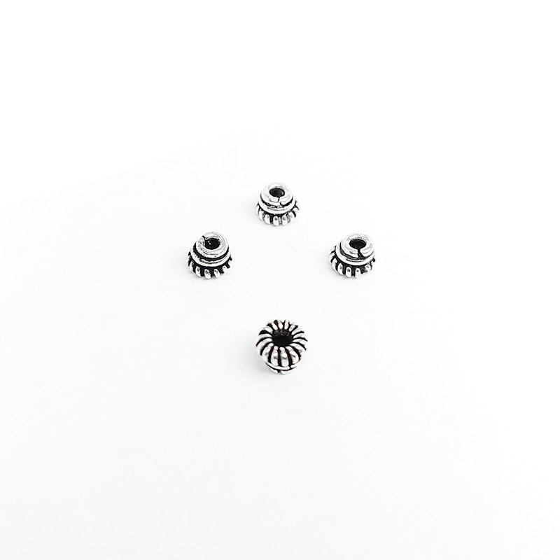 Silver Overlay Over Copper ribbed cone spacer bead handcrafted in India, traditional metallic finish jewelry making component.