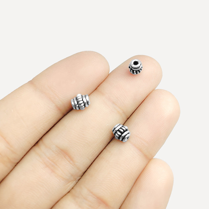 Silver Overlay Over Copper ribbed barrel spacer bead handcrafted in India, traditional metallic finish jewelry making component.