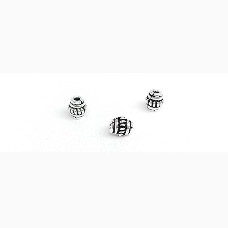 Silver Overlay Over Copper ribbed barrel spacer bead handcrafted in India, traditional metallic finish jewelry making component.