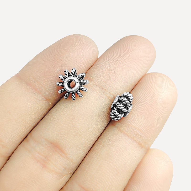 Silver Overlay Over Copper twisted floral ring spacer bead handcrafted in India, rope-style metallic detailing jewelry making component.