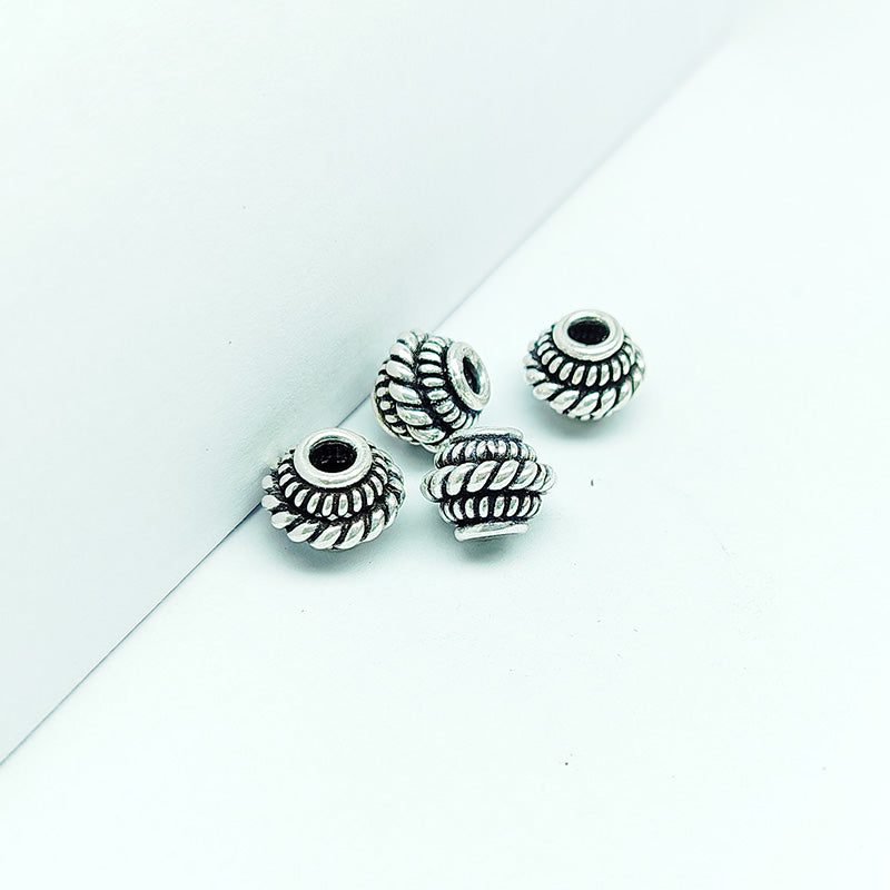 Silver Overlay Over Copper spacer beads handcrafted in India, decorative metal spacers for jewelry making.