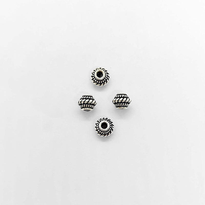 Silver Overlay Over Copper spacer beads handcrafted in India, decorative metal spacers for jewelry making.
