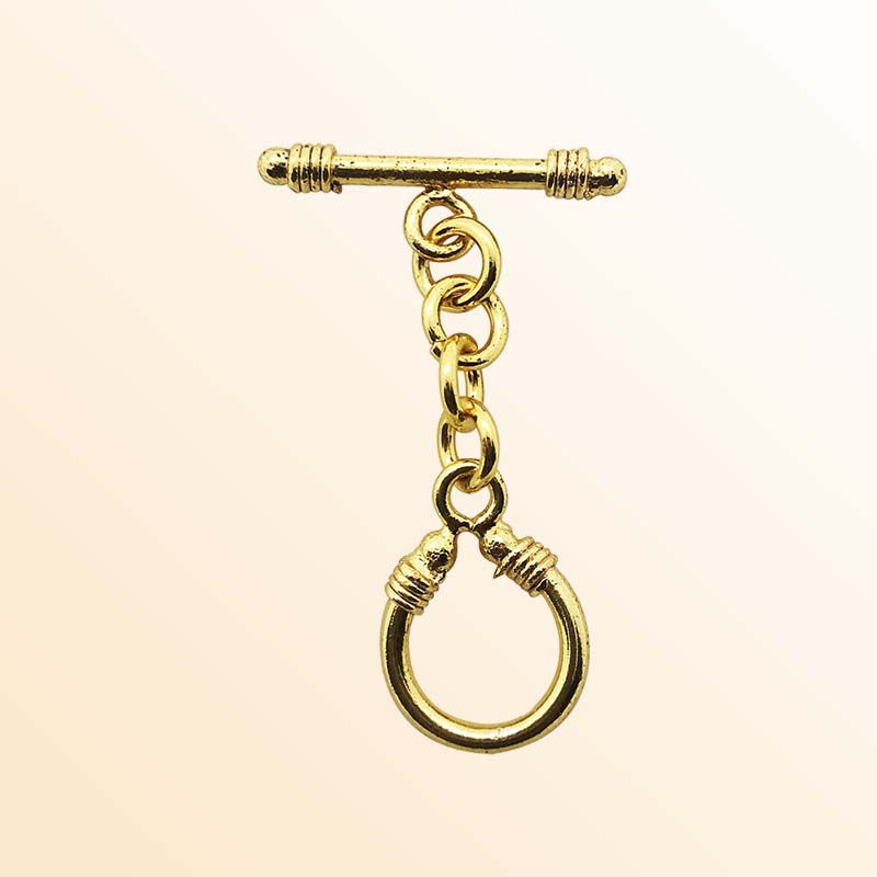 Handmade 18K gold overlay toggle clasp with polished decorative loop and elongated bar, crafted in India for bracelets and necklaces