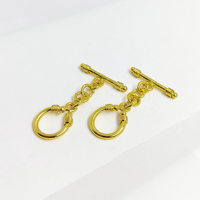 Handmade 18K gold overlay toggle clasp with polished decorative loop and elongated bar, crafted in India for bracelets and necklaces